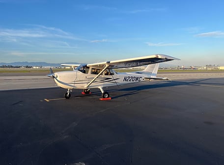 Cessna 172 G1000 N220WC on the ramp in late-afternoon light